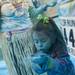 A young runner blows colored powder during the Ypsilanti Color Run on Saturday, May 11. Daniel Brenner I AnnArbor.com